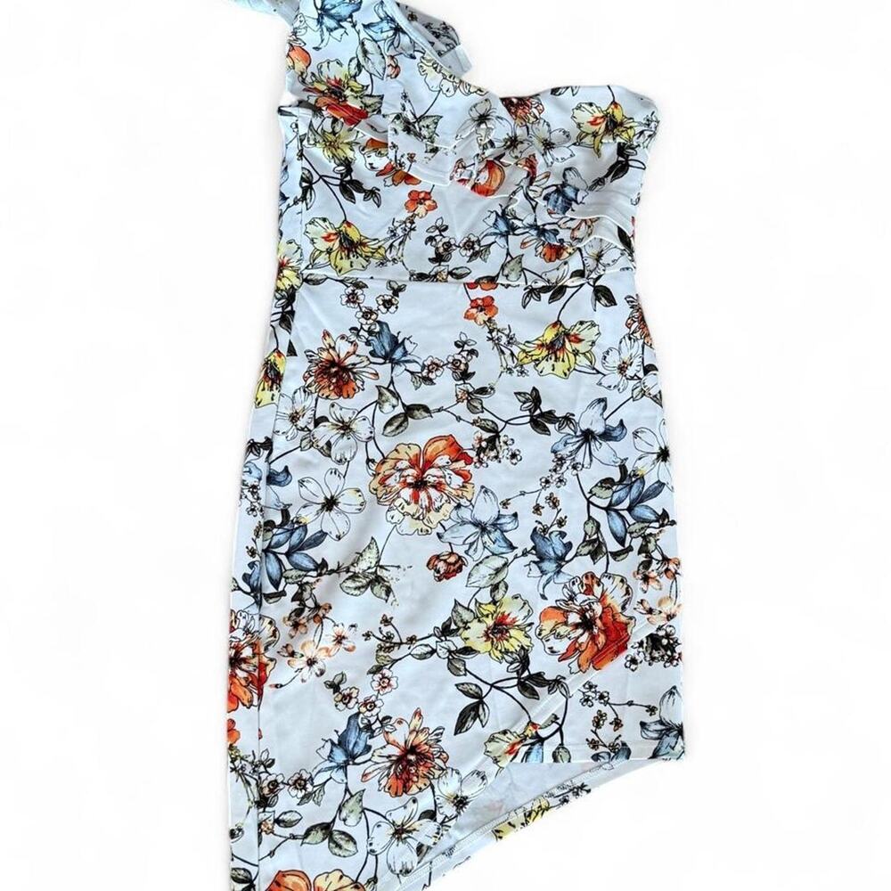 White one shoulder dress with ruffled